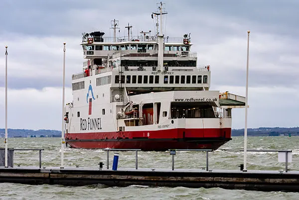 a red funnel ferry leaving cowes on the isle of wight